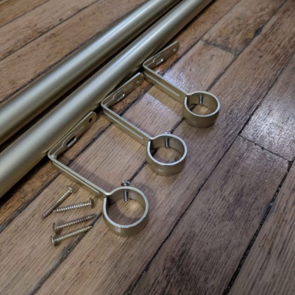 Umbra Cappa Curtain Rod in gold, 66" to 120" 🪟
